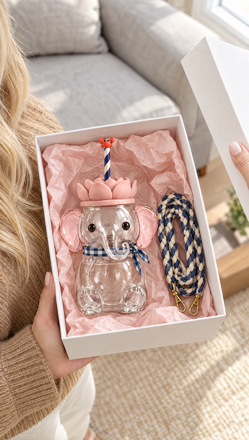 Mali in its white gift box with pink tissue paper